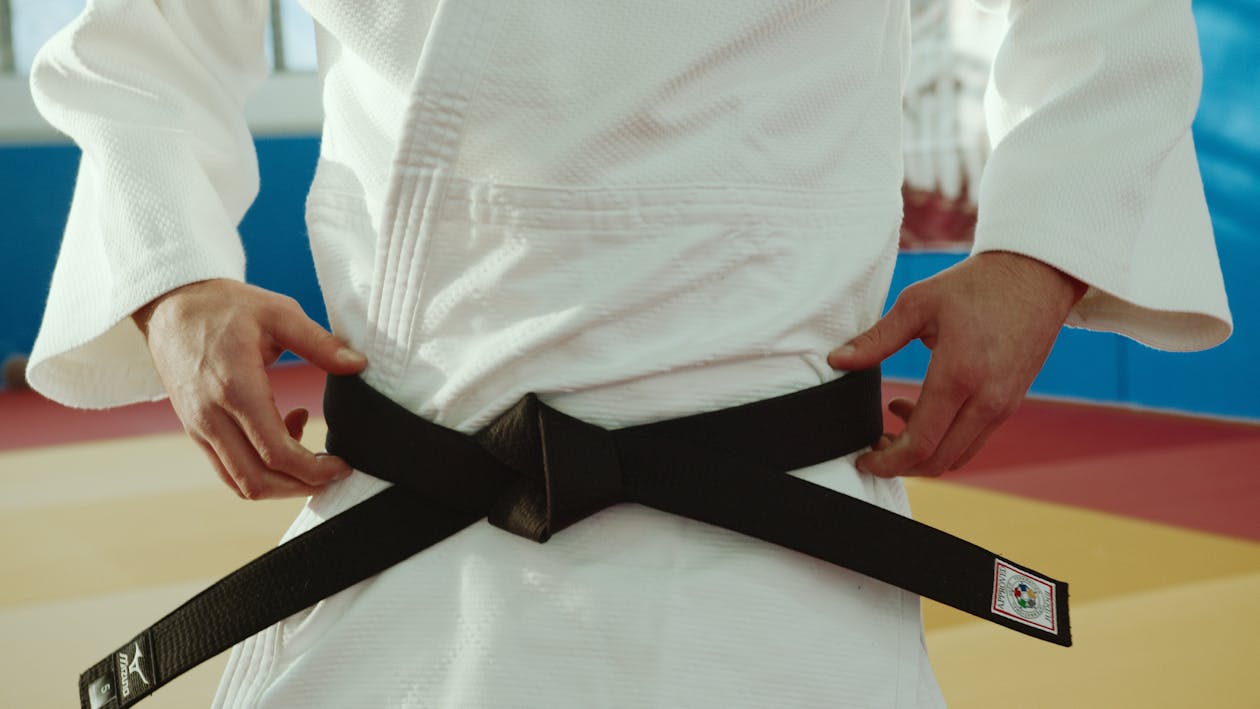 Free Close-Up Shot of a Person Wearing a Black Belt Stock Photo