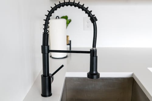 Free Photograph of a Sink with a Black Faucet Stock Photo