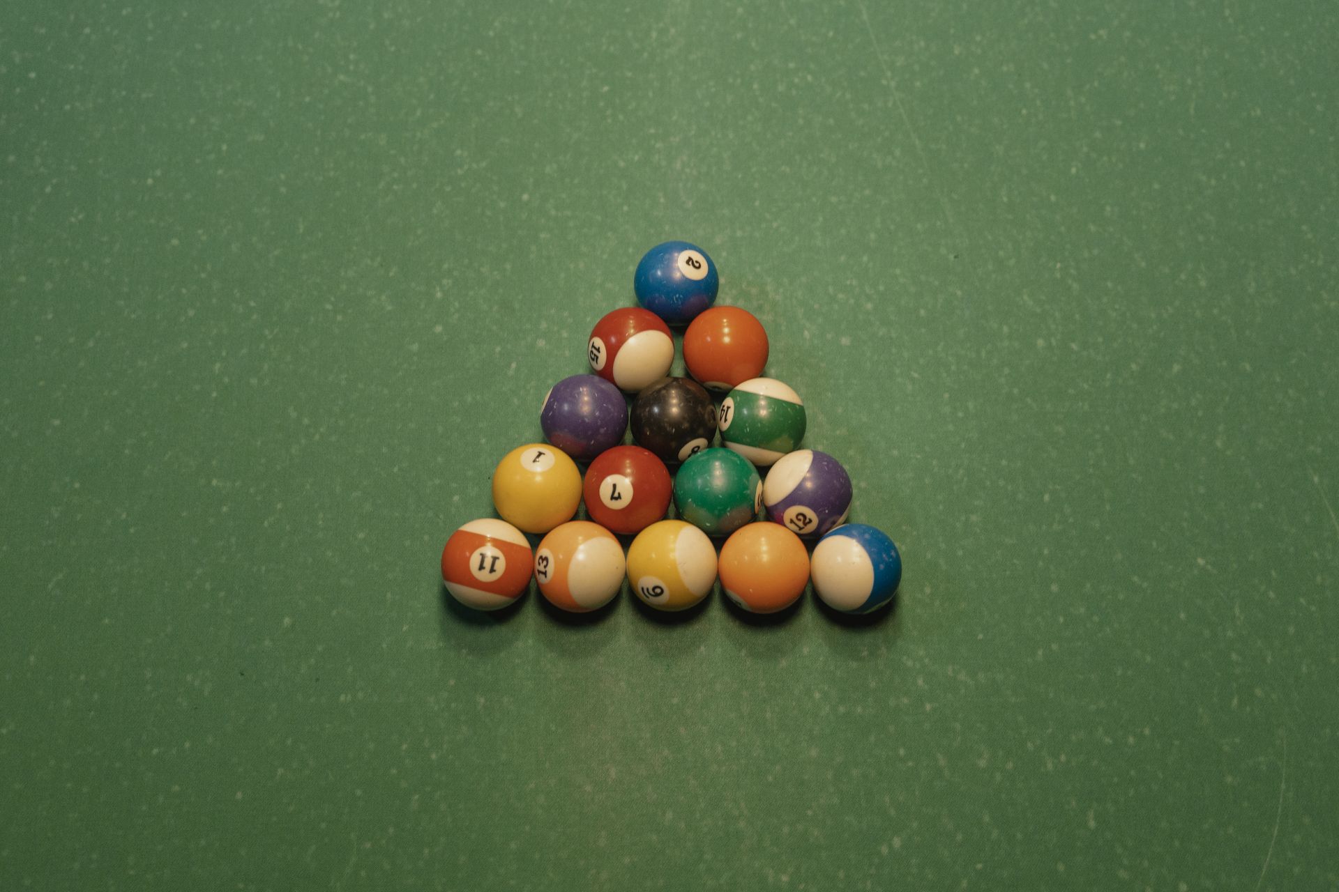 Billiard Balls on the Surface of a Pool Table