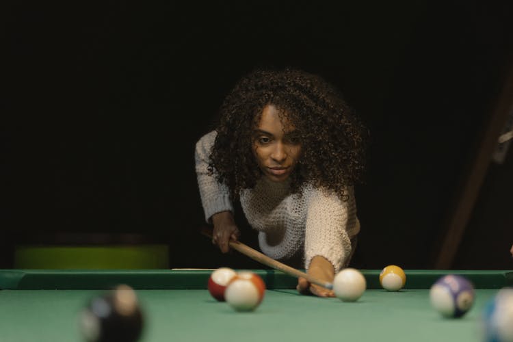 Woman Playing Billiard