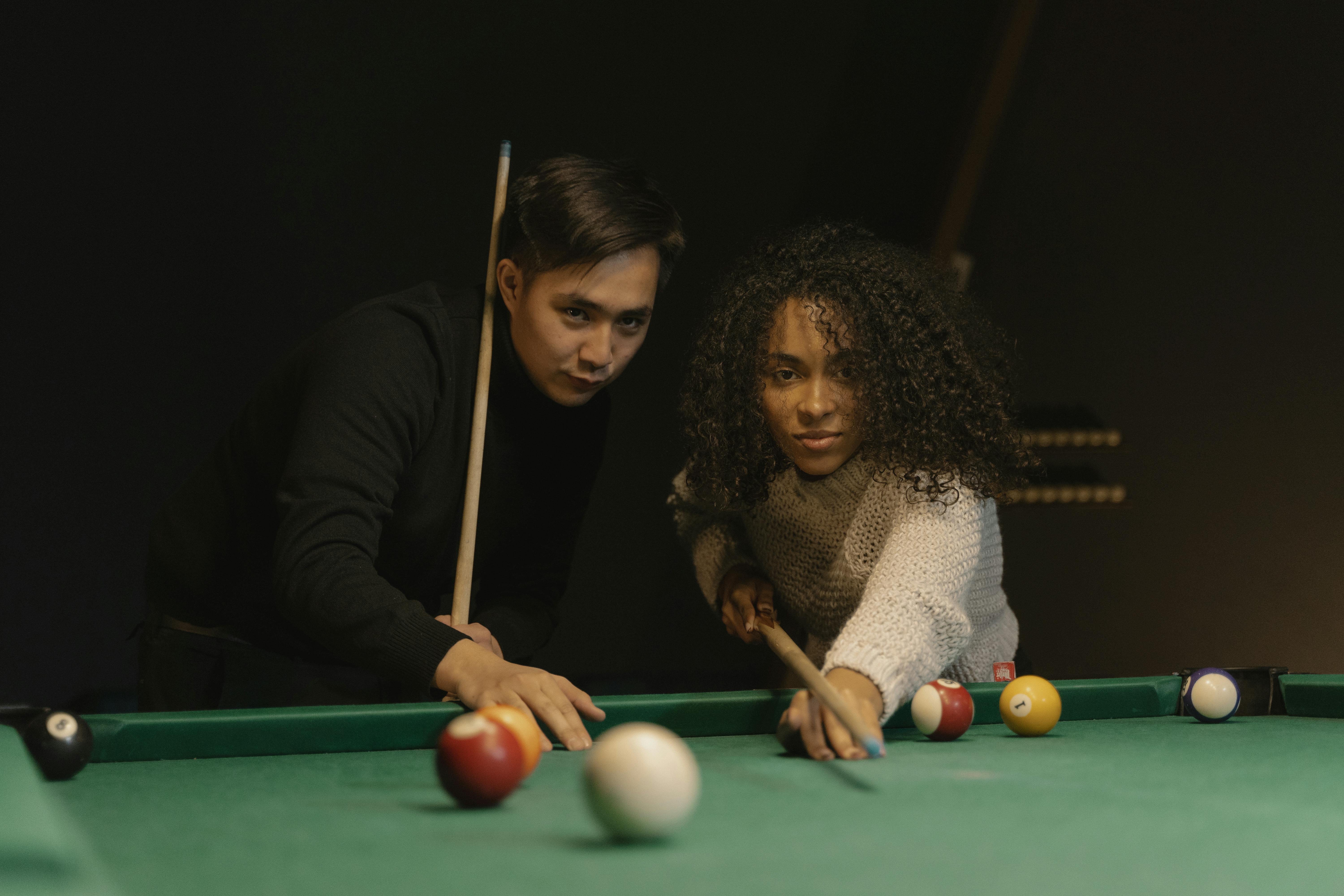 Close-Up Shot of a Man and a Woman Playing Billiards · Free Stock ...