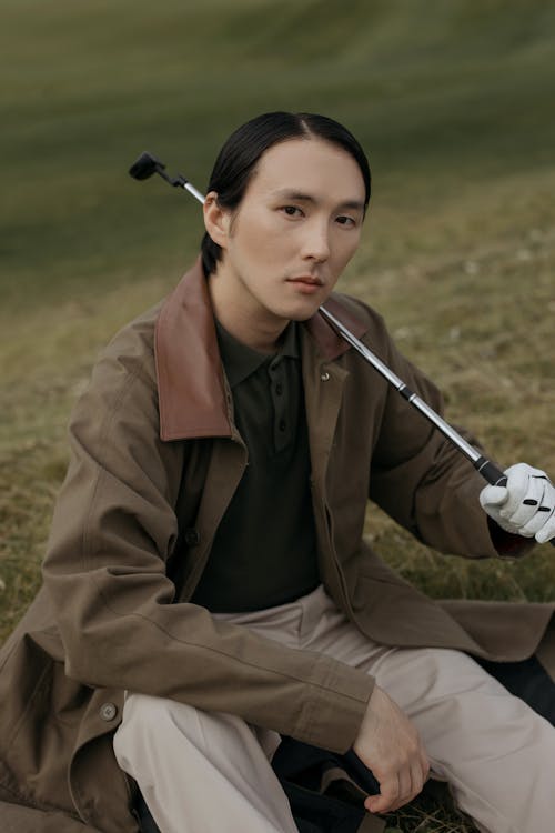 Imagine de stoc gratuită din bărbat asiatic, club de golf, fotografiere verticală
