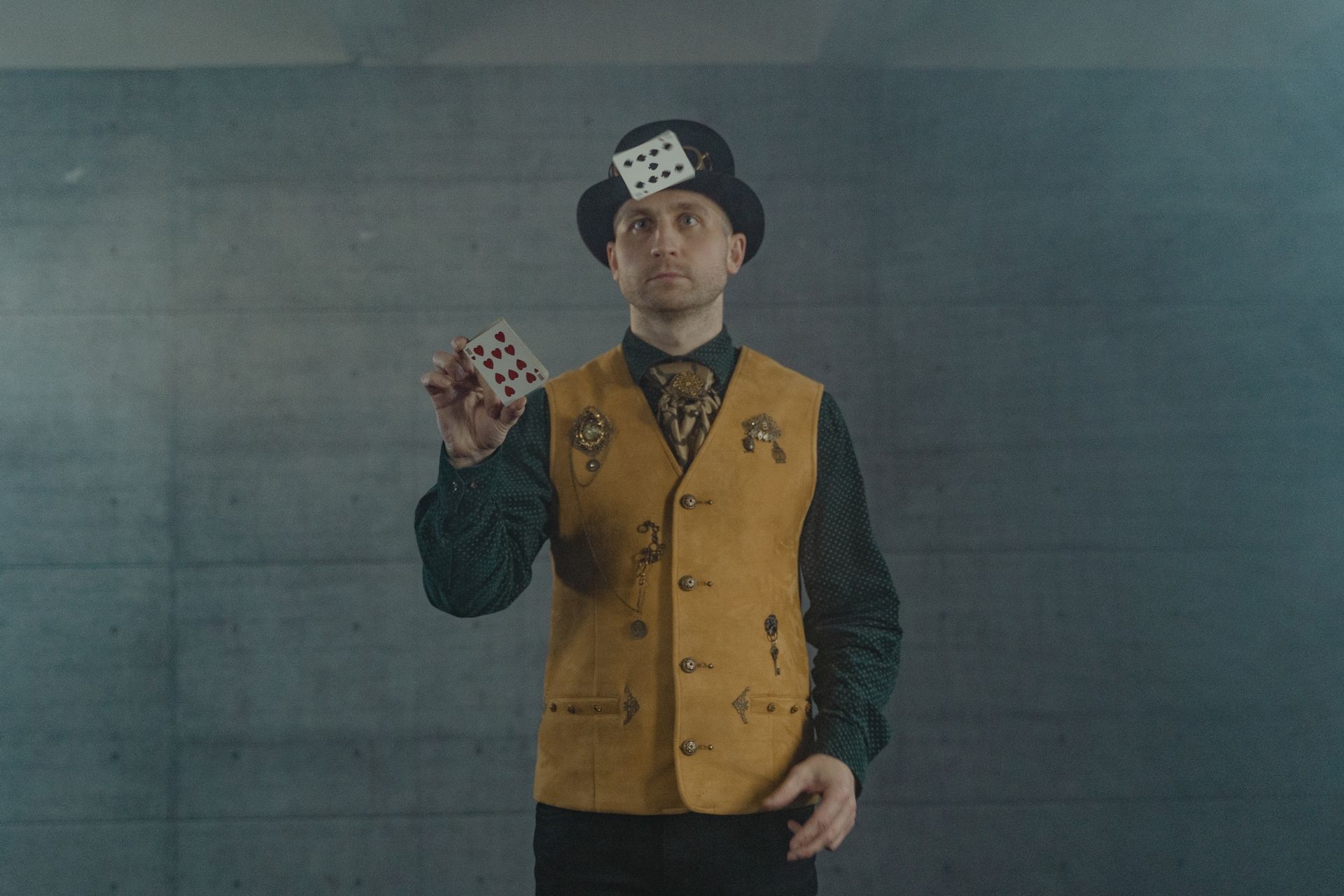 A Man Doing Magic using Cards