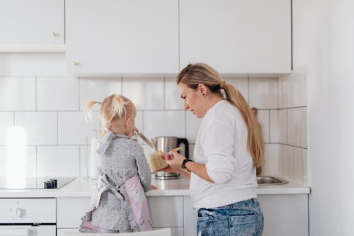 Mother with Daughter in Kitchen