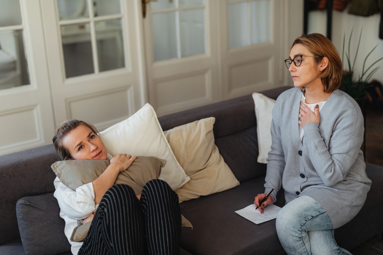 A therapist in a warm counseling session with a client