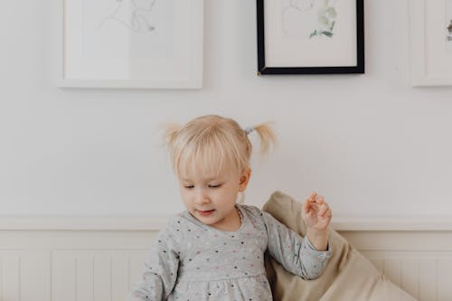 Free A Cute Girl Wearing Gray Dress Stock Photo