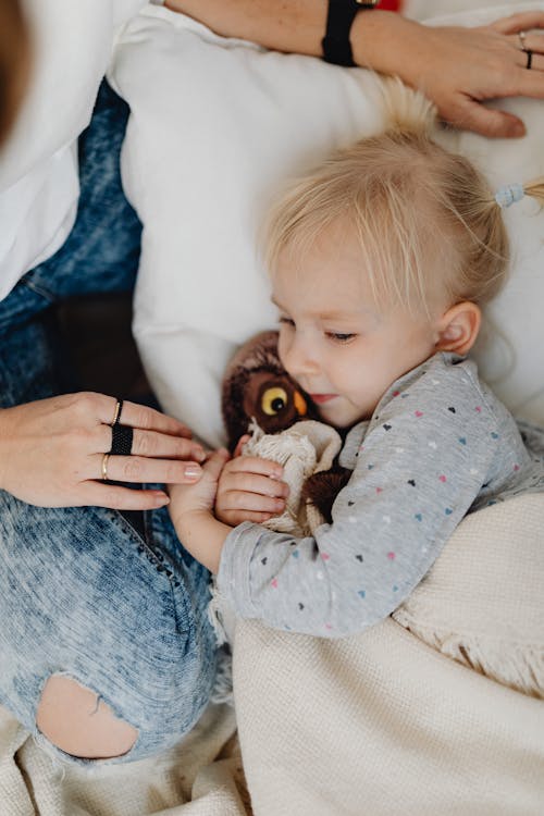 Free A Girl Hugging Her Stuffed Toy Stock Photo