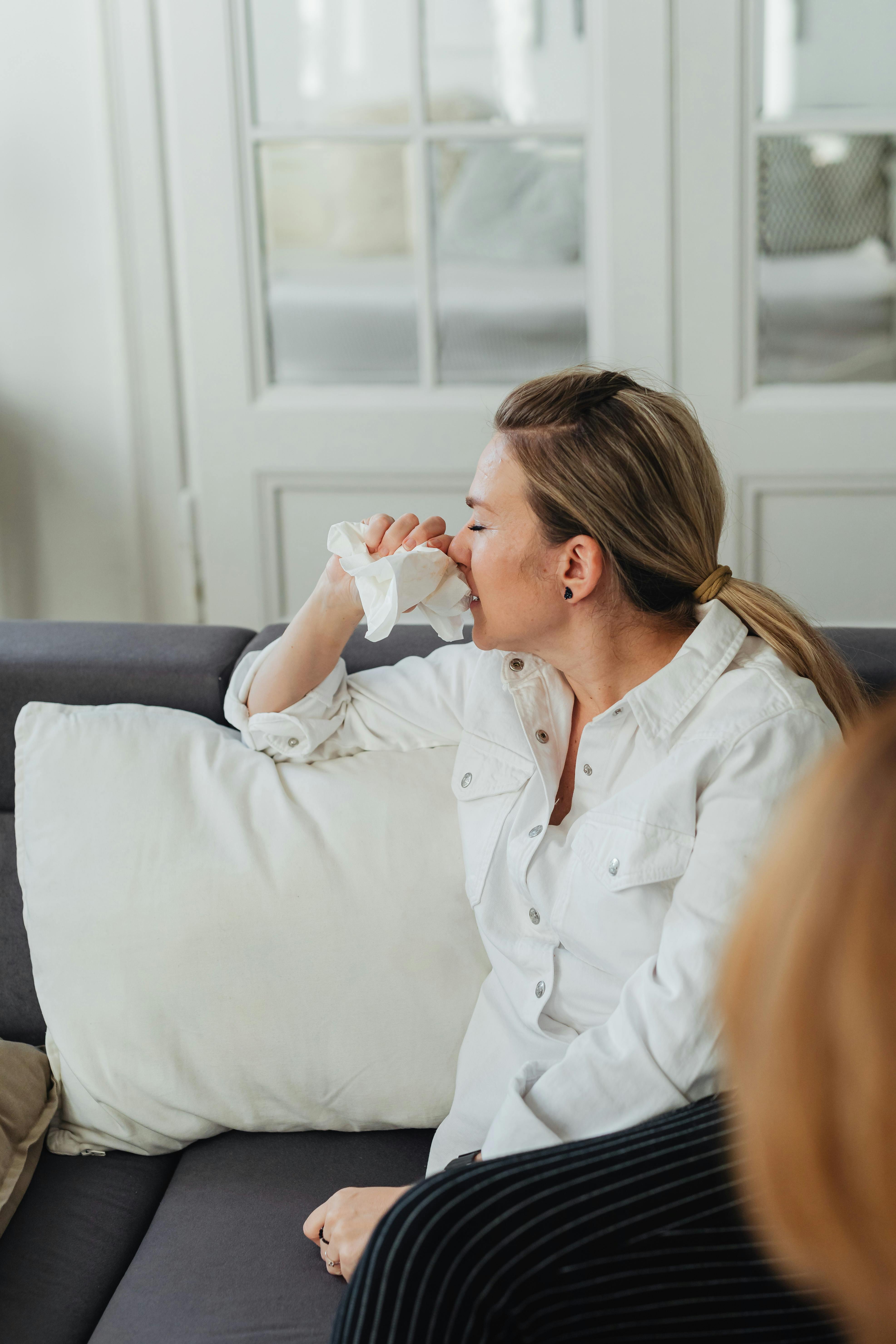 crying woman with a tissue