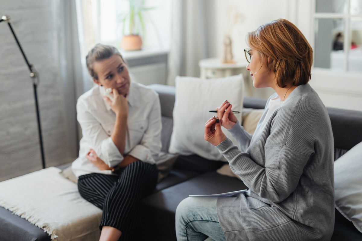 Therapist guiding a client through an EMDR session for betrayal trauma healing