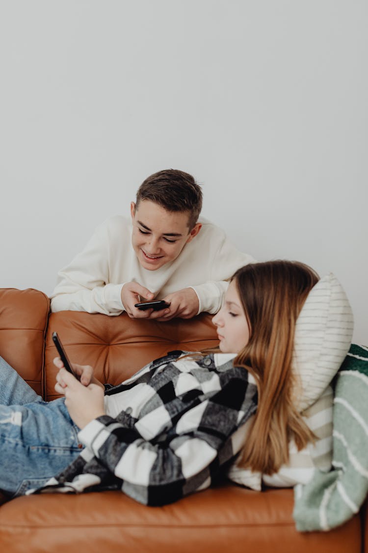 Couple Using Smartphones Together