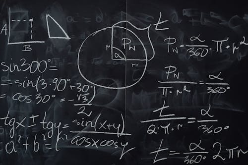 Blackboard with Handwritten Calculations