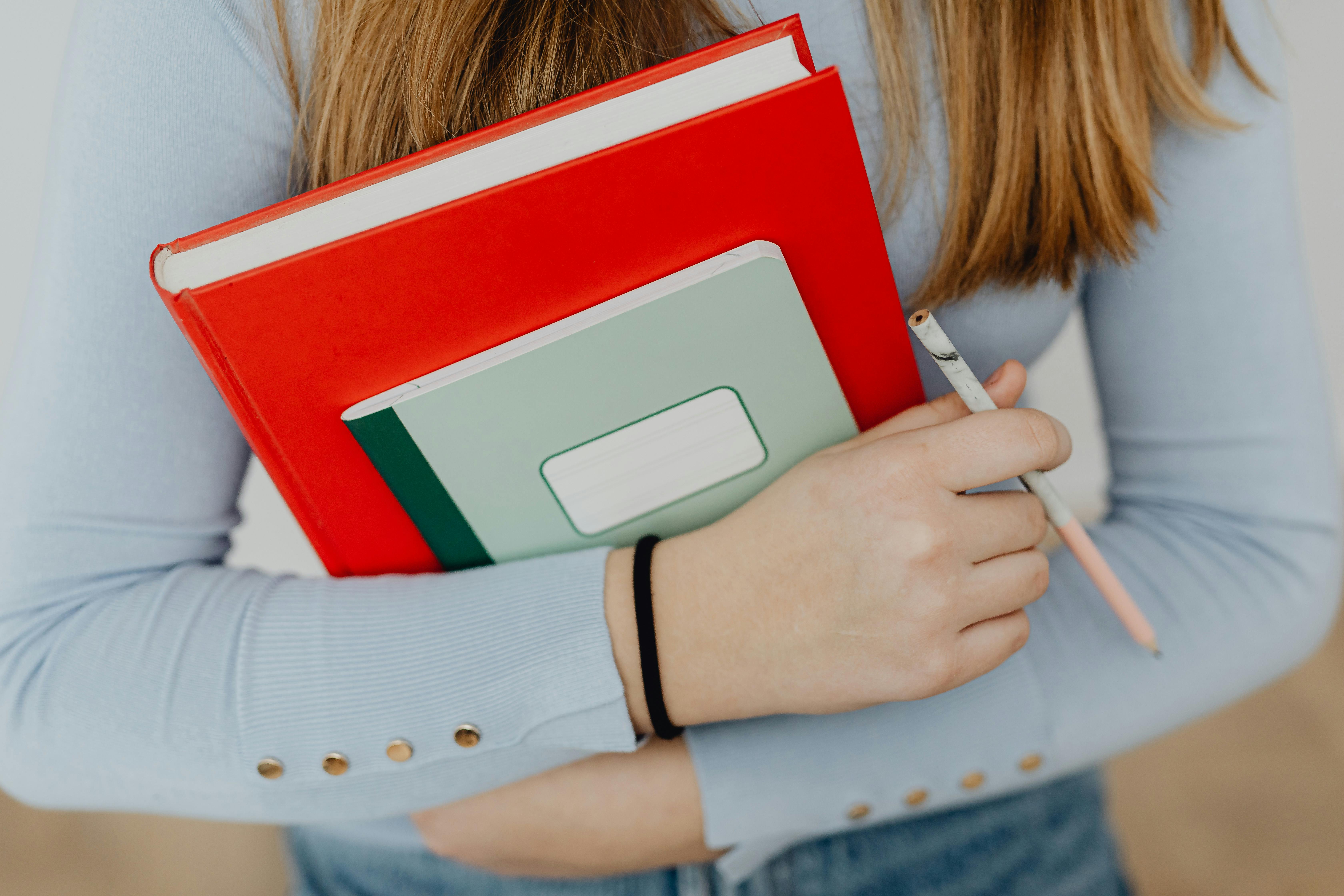 Closeup Photo of Journal Book and Pencils · Free Stock Photo