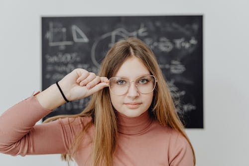 Portrait of a Pretty Girl Wearing Eyeglasses