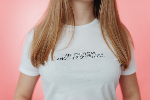 Free Girl with a Phrase on her T-shirt Stock Photo