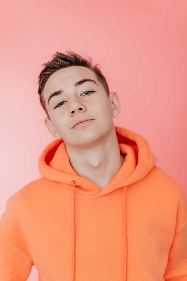 Young Boy In An Orange Hoodie 