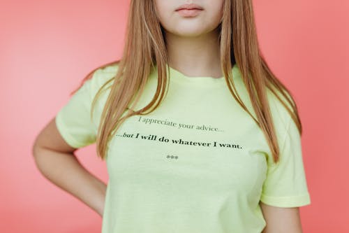 A Person in a Yellow Shirt with a Printed Message