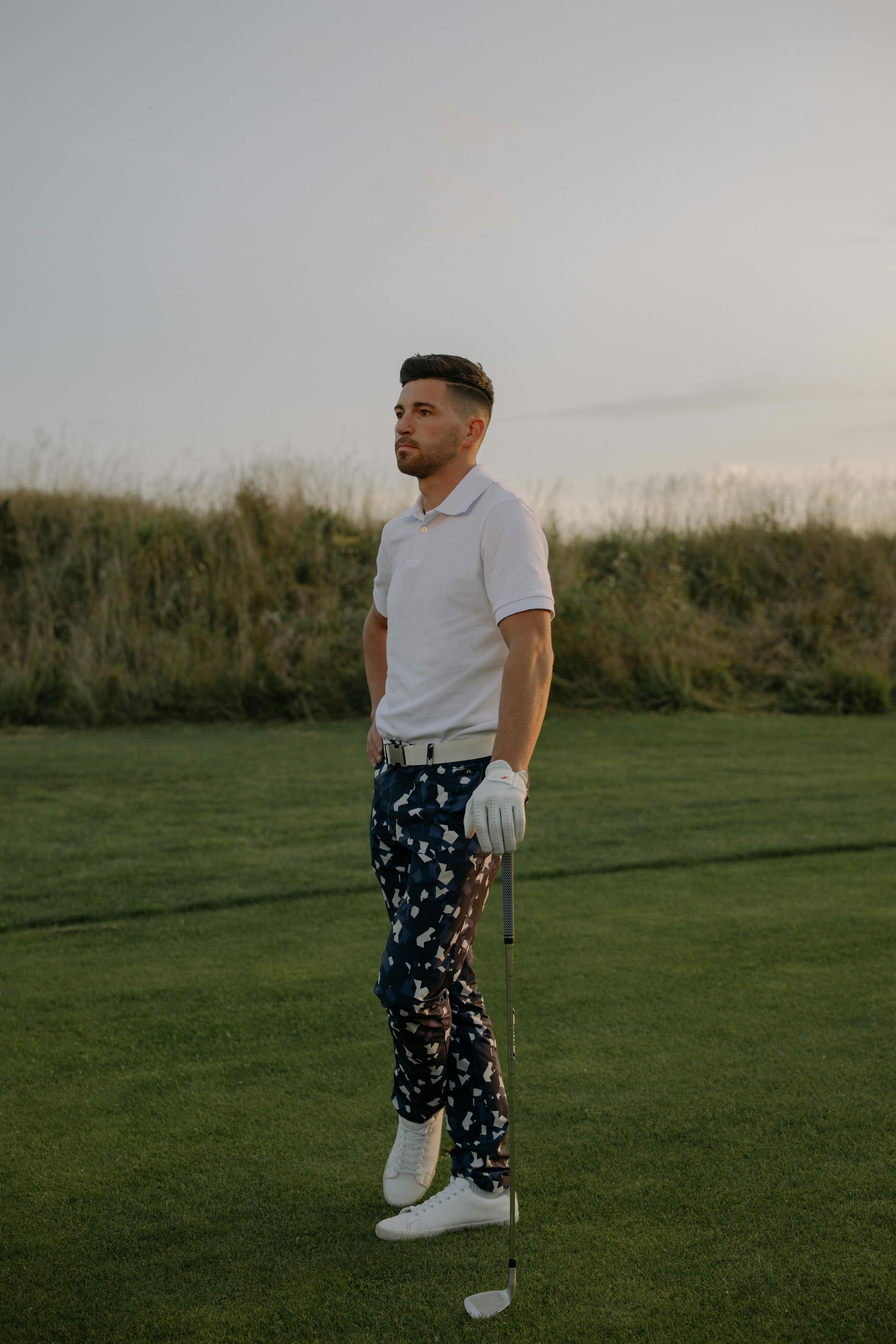 Man in White Crew Neck T-shirt and Black and White Checkered Pants ...