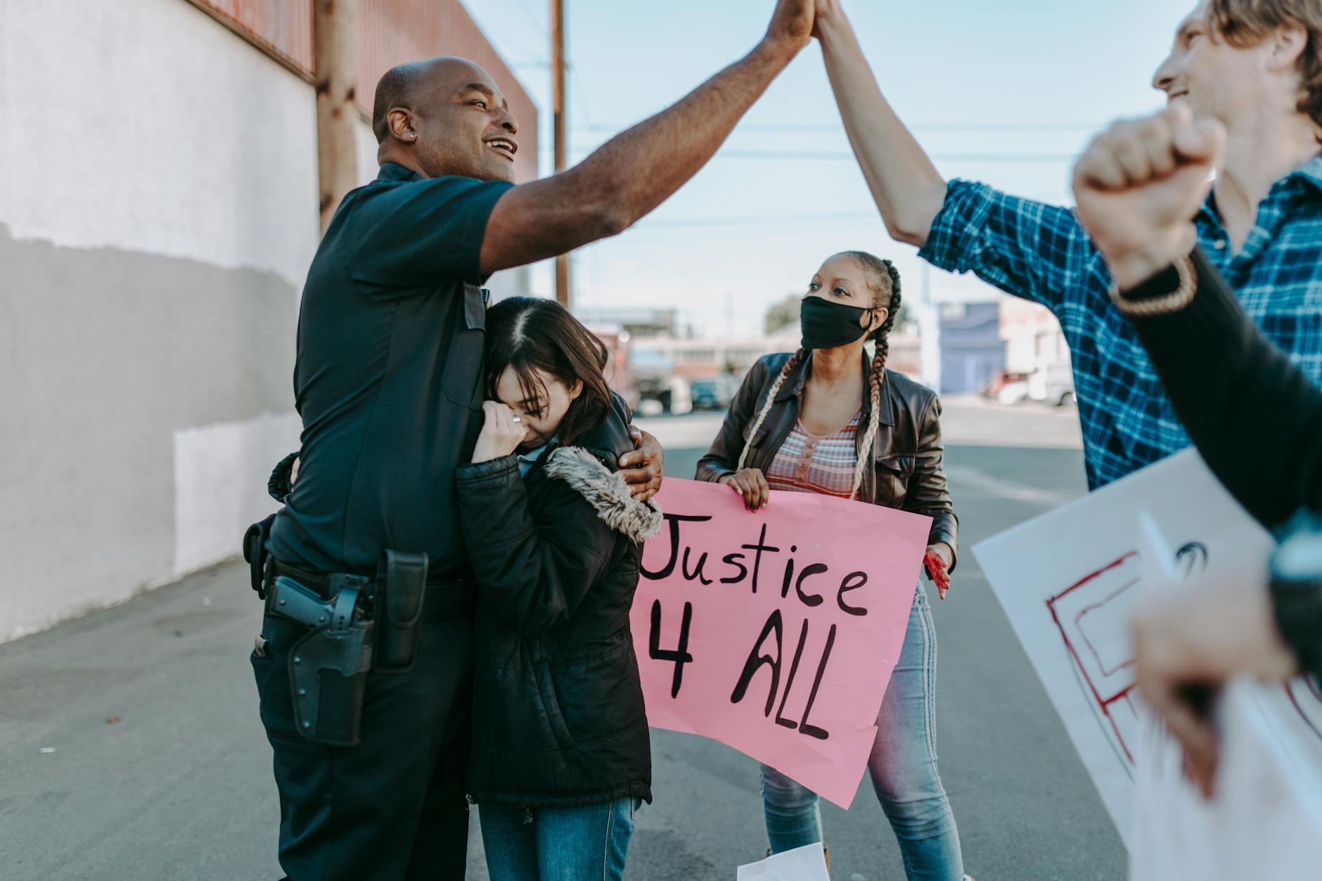 A diverse group of people peacefully protesting for justice and equality.