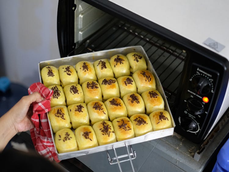 A Person Baking Buns