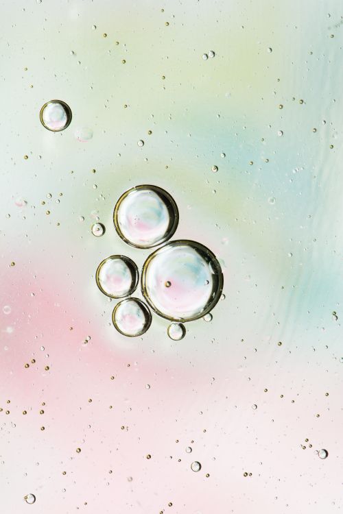 Free Colorful abstract image with bubbles suspended in liquid, showcasing purity and elegance. Stock Photo