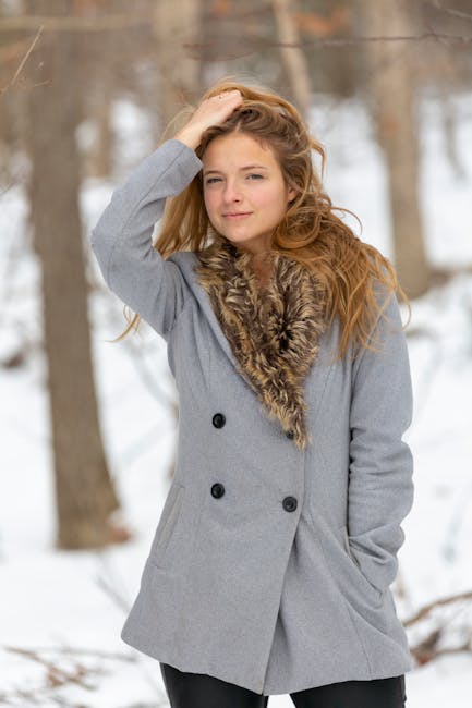 Stylish woman in outerwear standing in forest on winter day · Free ...