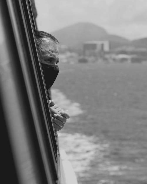 Man travelling on boat on sea