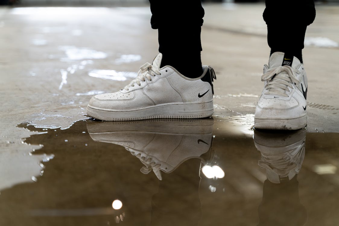 Person Wearing White Nike Air Force 1 High