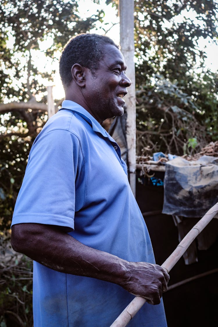 Portrait Of A Man In A Blue Polo Shirt