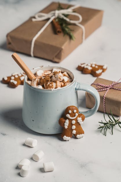 Christmas hot chocolate mug with gingerbread man and marshmallows