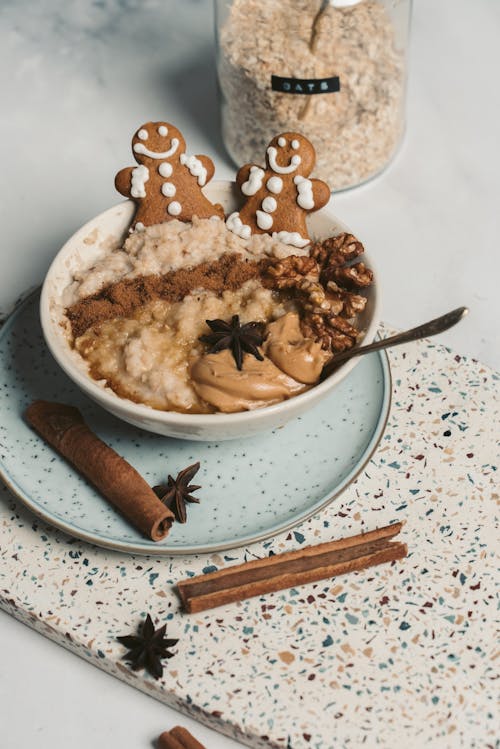 Free Gingebread Man Coookies and Oatmeal in a Bowl Stock Photo