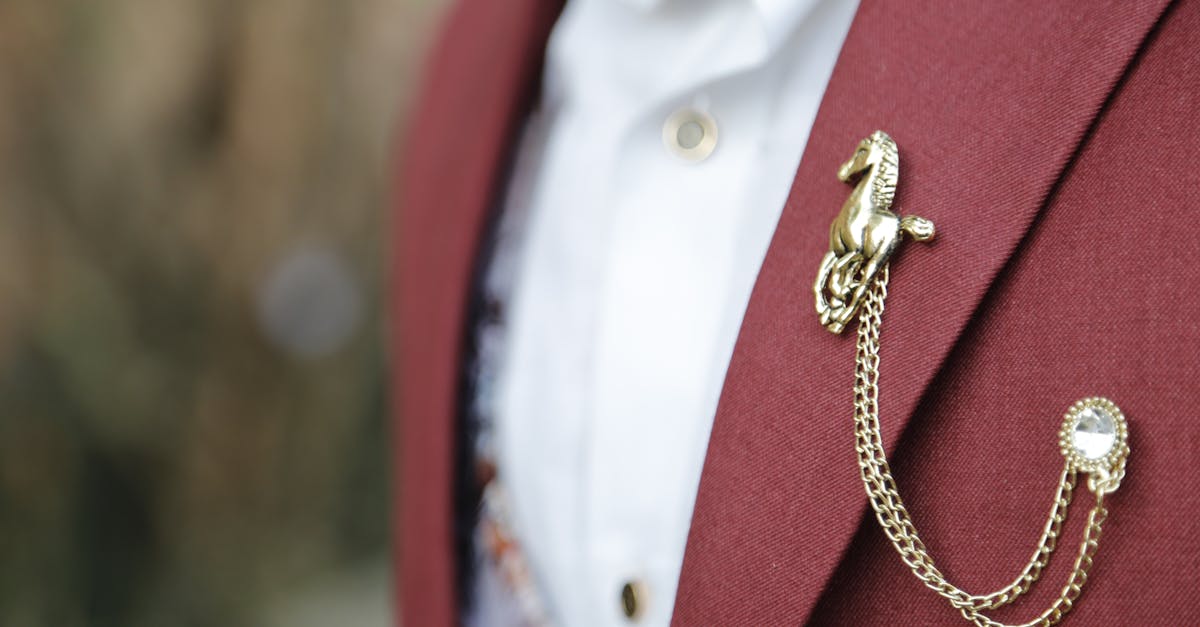 Minimalist Fashion Styling With A Single Statement Brooch On A Jacket Lapel