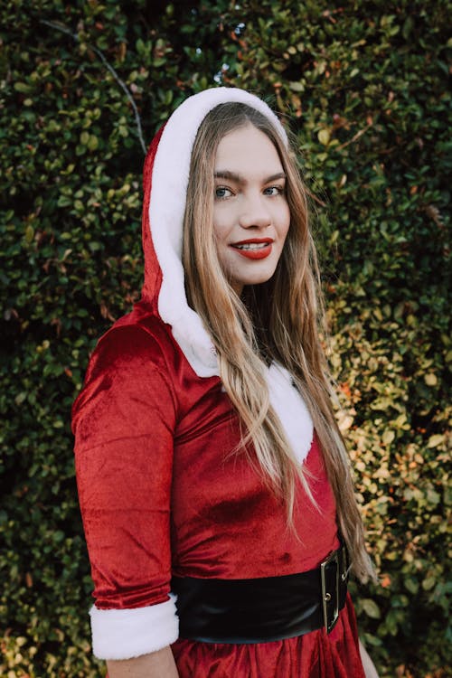 Woman in Red Long Sleeve Shirt Smiling