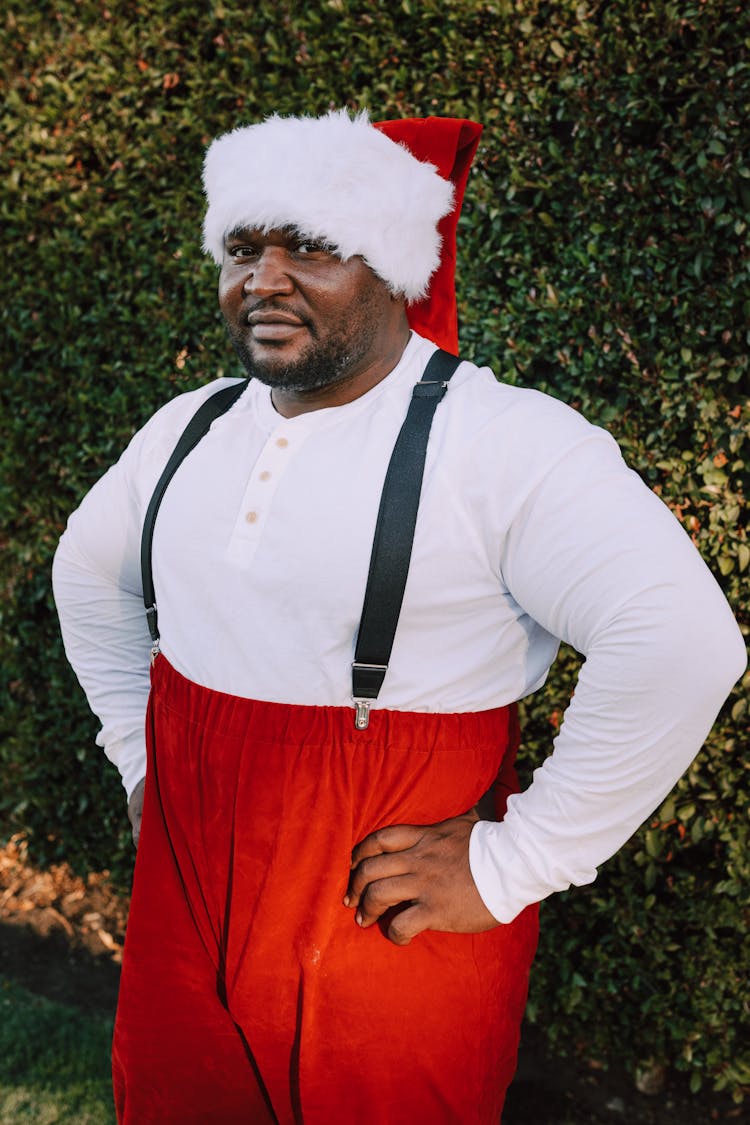 A Man Wearing A Santa Costume