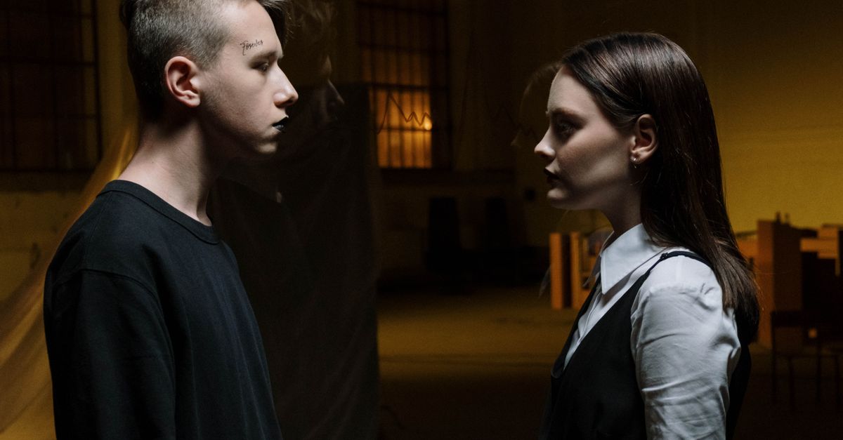 Moody scene from Counterpart with two J.K. Simmons facing each other