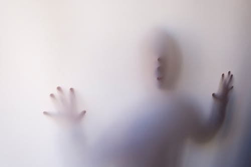 Free Person Behind White Cover Stock Photo