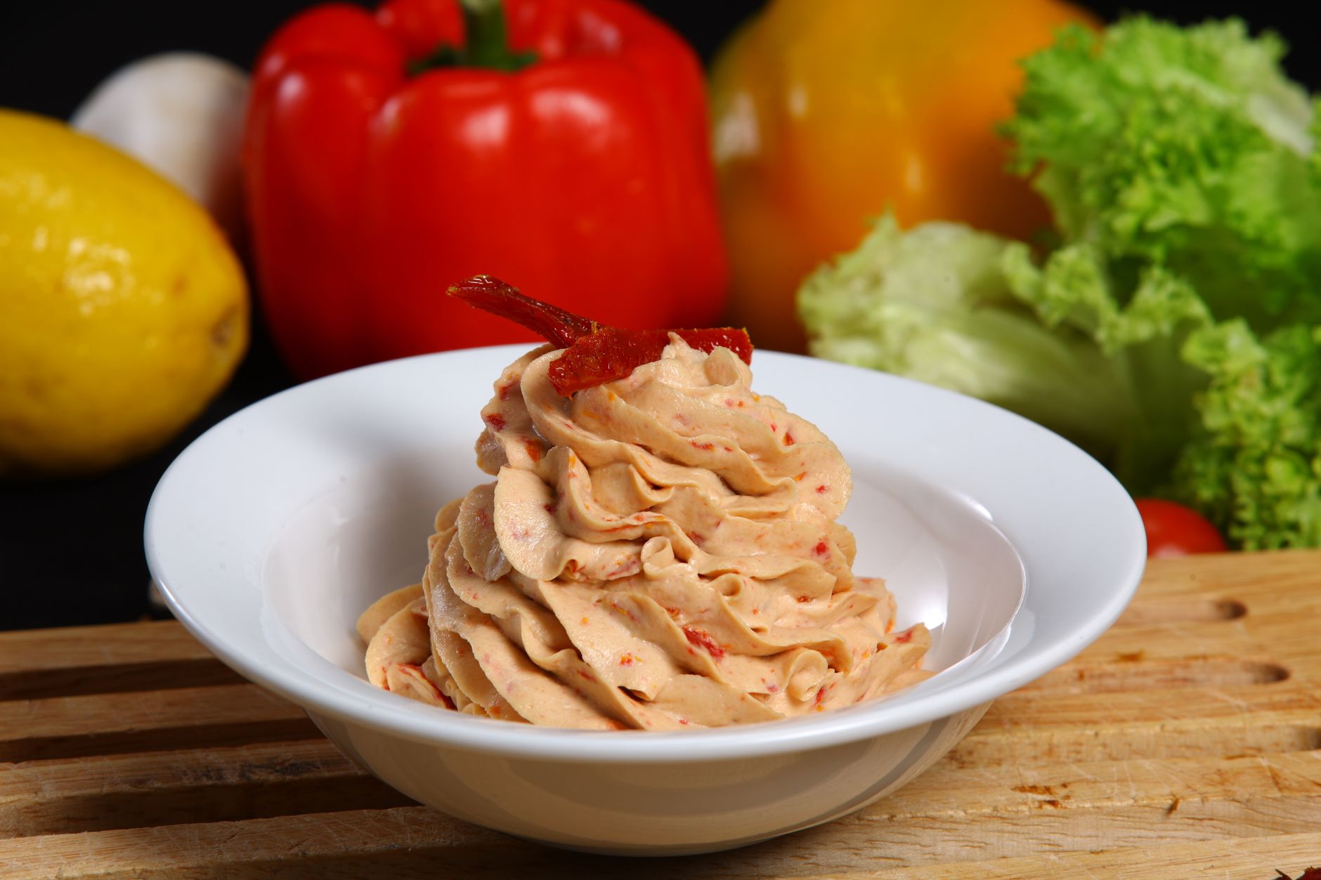Roasted red peppers and fresh lemon for aioli preparation