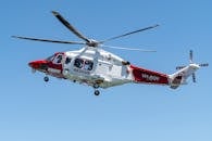 White Helicopter Flying in the Sky