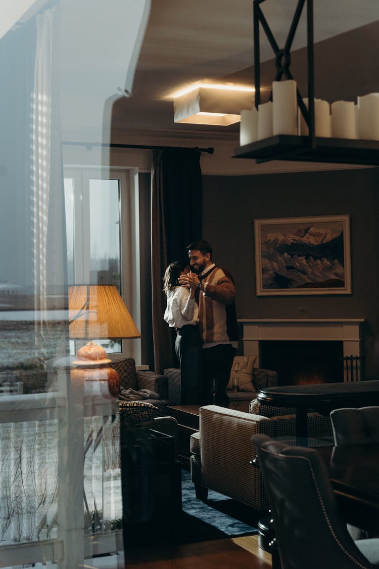 Beautiful Couple Dancing In The Living Room