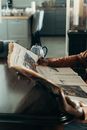 Person Reading the Newspaper
