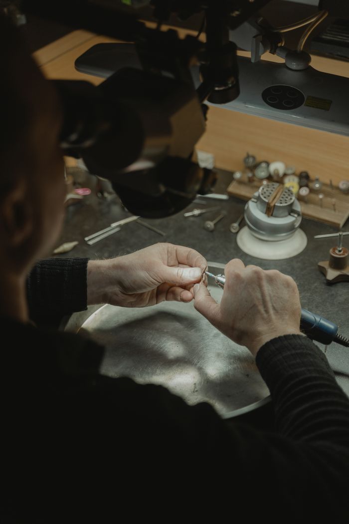 Detailed hand work on a piece of jewellery