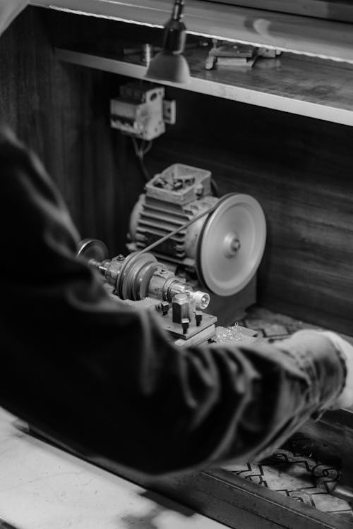 A Craftsman Using a Grinder