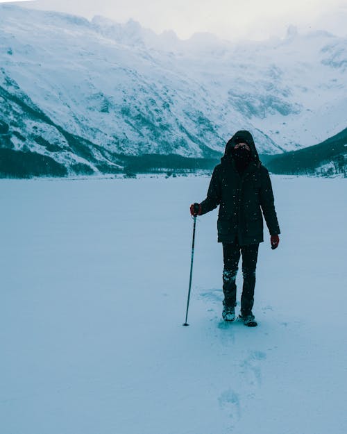 Person Holding a Trekking Pole