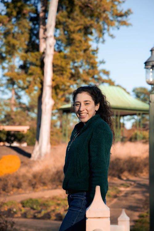 A Woman in a Green Sweater