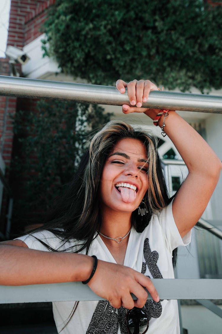 A Young Woman Sticking Her Tongue Out