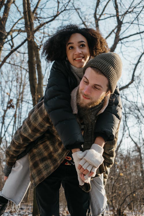 Woman At The Man's Back