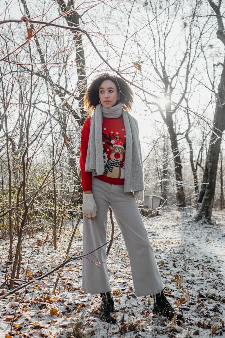 Curly Haired Woman In Red Christmas Sweater