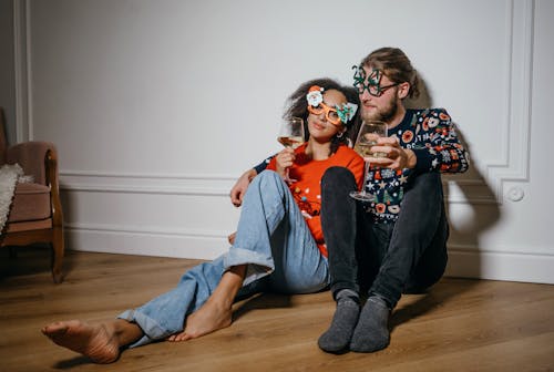 A Couple Sitting on the Floor