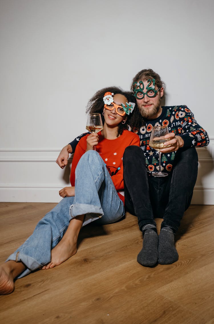 Couple Women Sitting On Floor