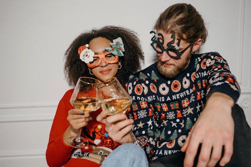 Free A Couple Toasting Their Glasses of Wine Stock Photo