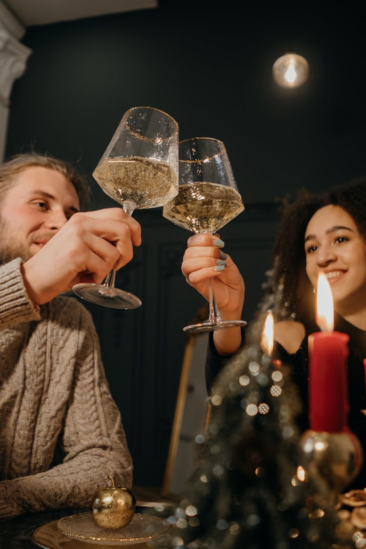 Couple Toasting Wine Glasses